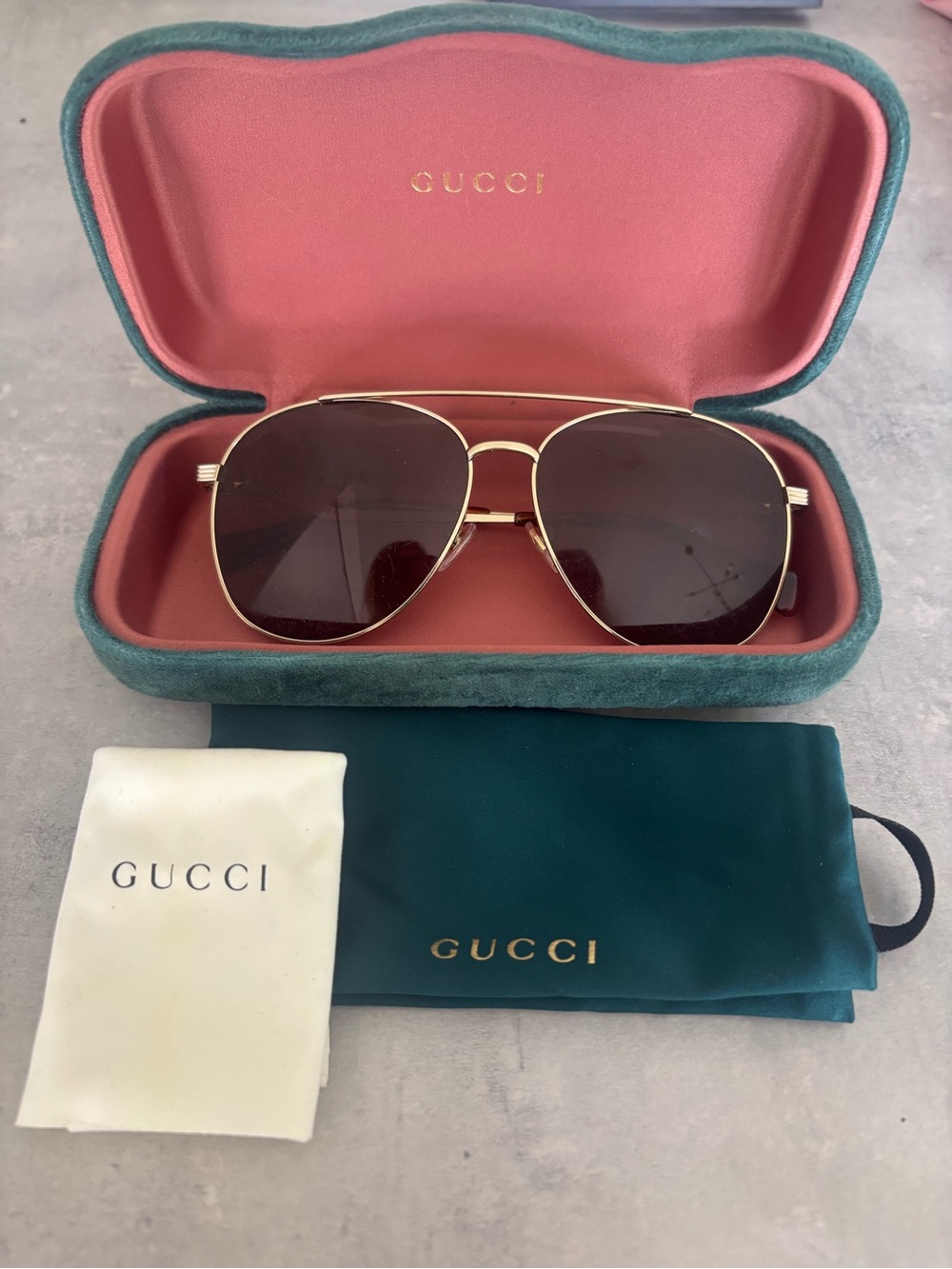 AUTHENTIC Gucci sunglasses. Comes with case, dust bag, and dust cloth
